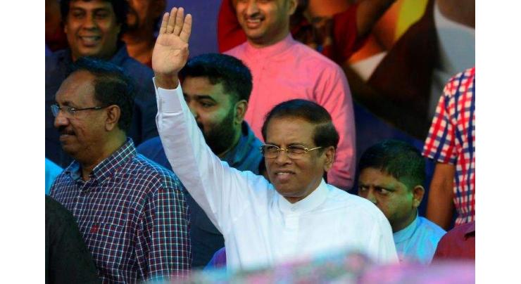 Sri Lanka crisis deepens as president calls snap election
