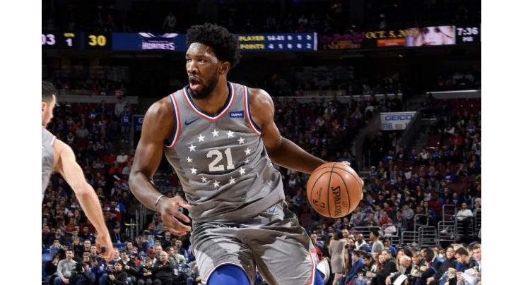 Embiid scores 42 as 76ers stay perfect at home
