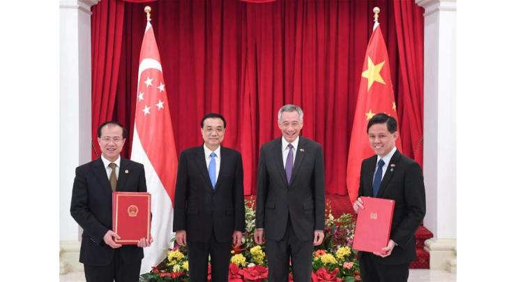 China, Singapore sign cooperation document on upgrading FTA
