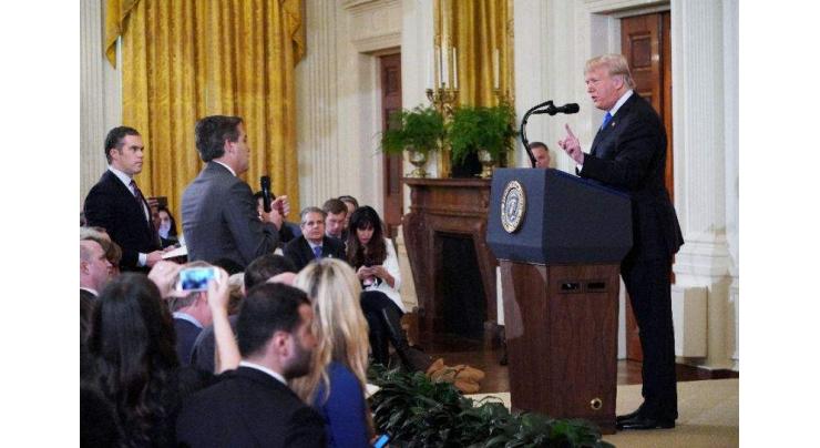 CNN sues over barring of reporter, White House vows vigorous defense
