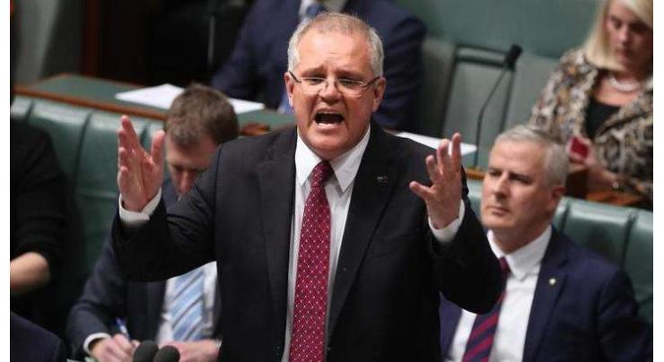 Australian Prime Minister Scott Morrison refuses to get snagged on sausage debate
