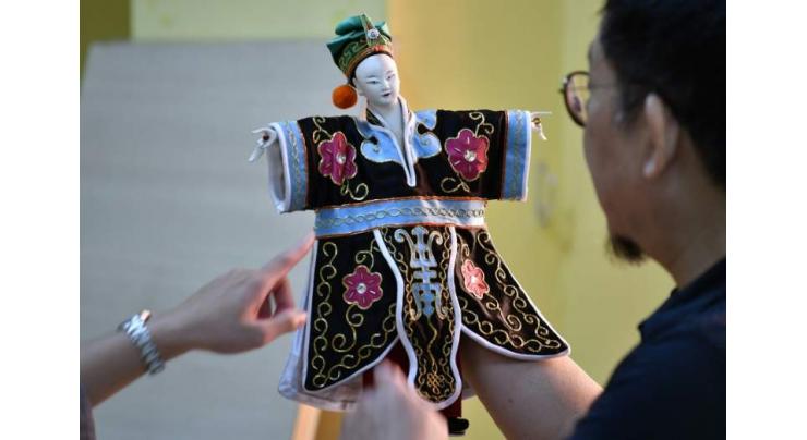Taiwanese puppet master fights to save dying art
