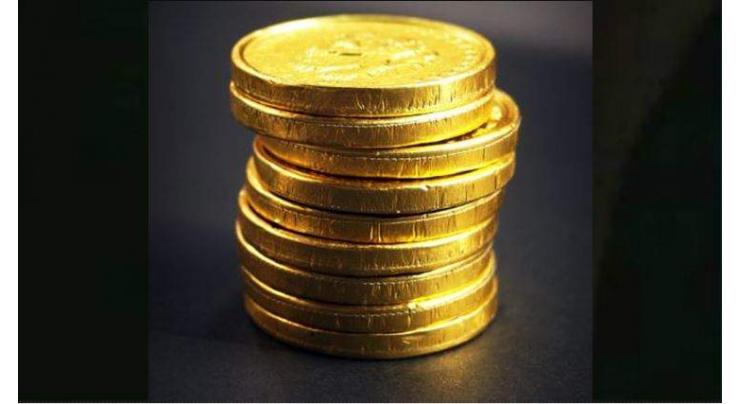 Iran executes two men for hoarding 2 tons of gold coins
