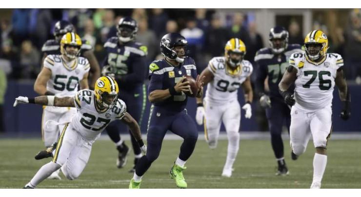 Wilson throws late TD as Seahawks rally for win over Packers
