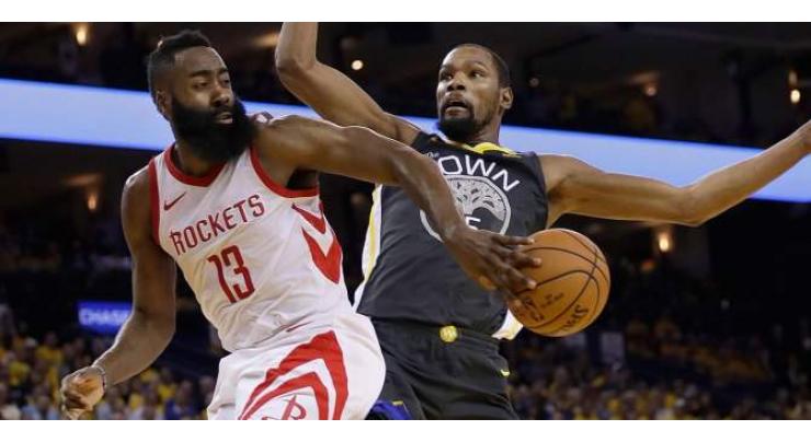 Rockets thrash 'banged up' Warriors, Nuggets bounce back
