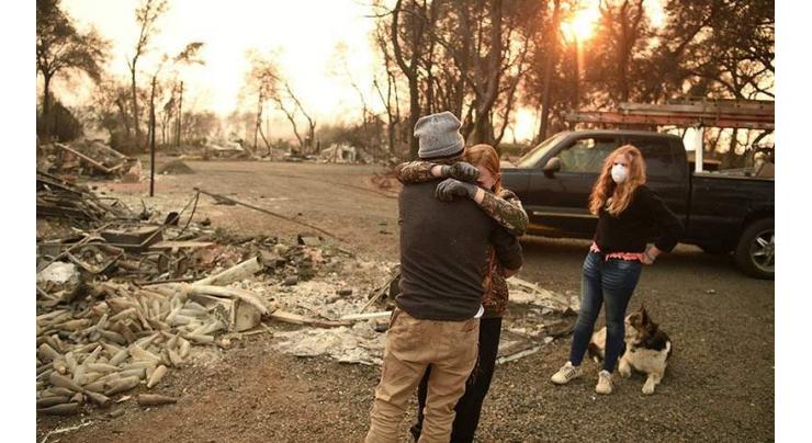 Victims mourned as toll hits 77 in California wildfire
