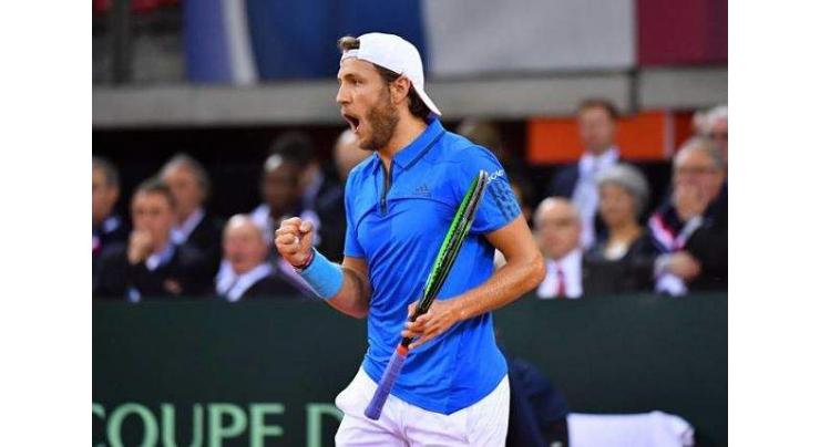 Pouille questions use of clay for Davis Cup final
