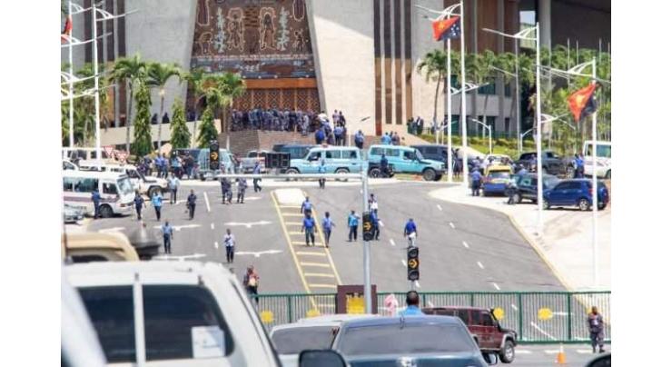 Papua New Guinea police, soldiers storm parliament over unpaid APEC bonuses
