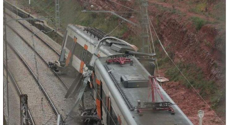 One dead, 49 hurt as landslide derails train in Spain
