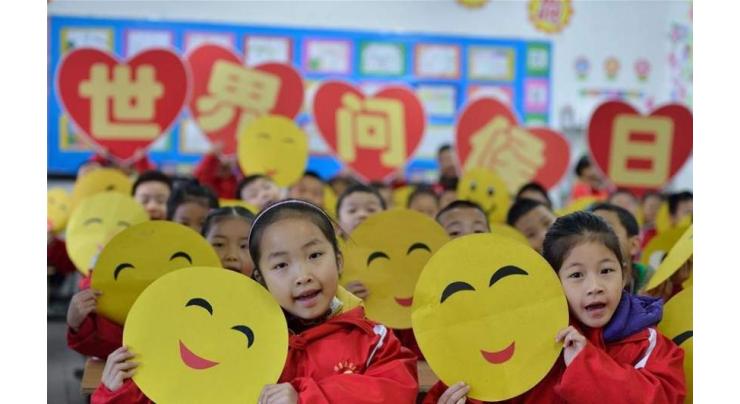 Chinese cities light up for World Children's Day
