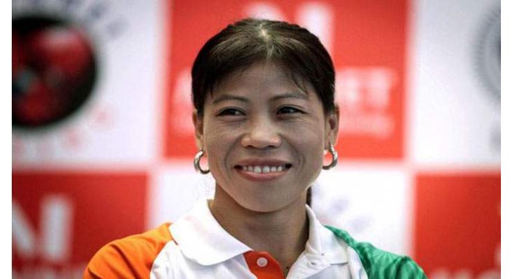 India's Kom marches toward record 7th world champ medal
