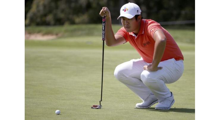 Australia, England, S. Korea share lead at golf World Cup
