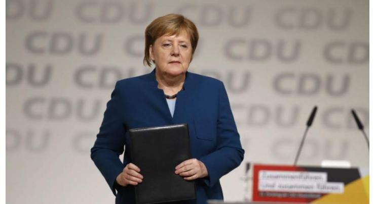 Merkel defends legacy as divided party picks new leader
