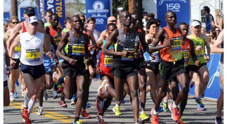 Kenyan men take first 17 places in Singapore marathon

