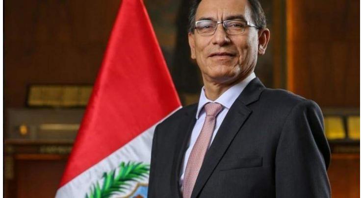 Shaken by corruption, Peruvians back major government overhaul
