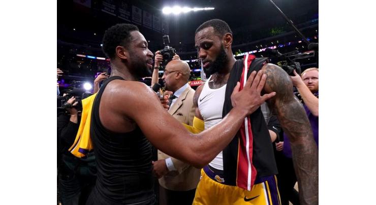 James wins final duel with Wade as Lakers roll on
