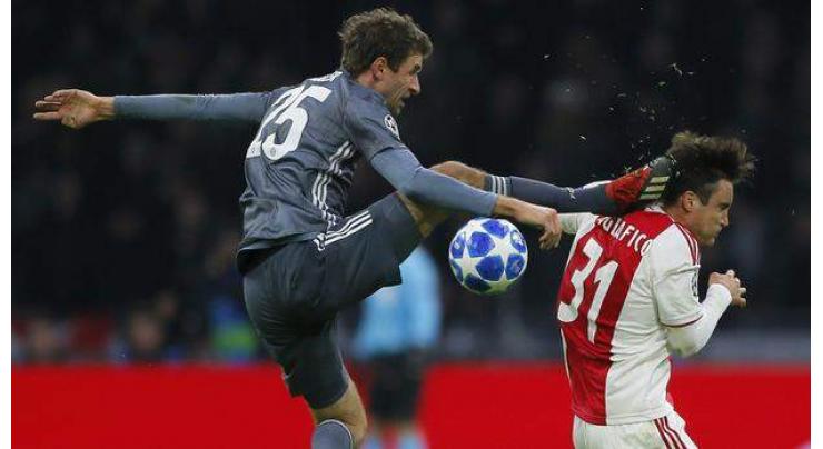 Bayern star Mueller apologises for horror kick on Ajax defender
