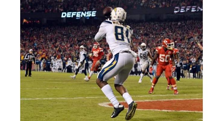 Chargers stun Chiefs late to clinch NFL playoff berth
