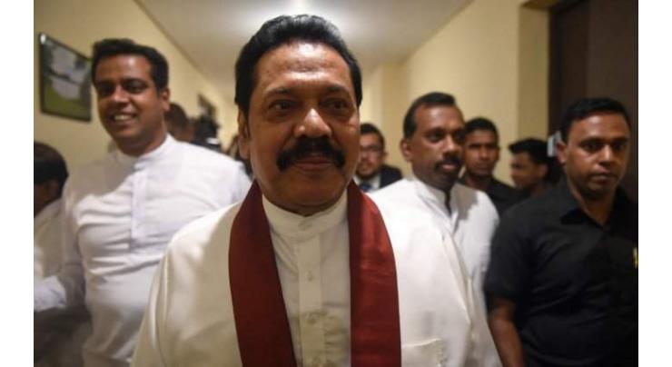 Sri Lanka's disputed premier Rajapakse steps down
