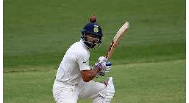 Kohli and Pujara dig in after India lose early wickets

