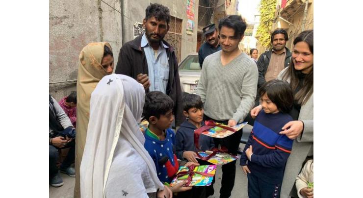 Ali Zafar visits his charity school with wife