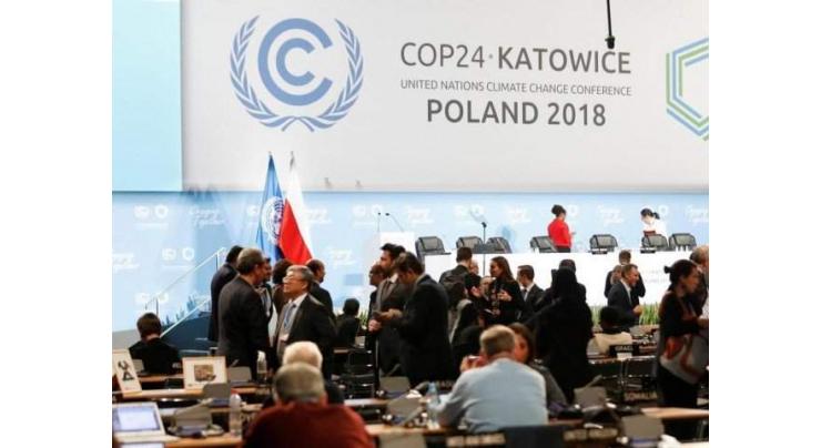 Nations inch towards climate deal at marathon UN summit
