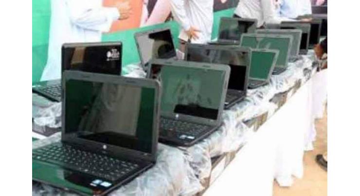 Allama Iqbal Open University distributes laptops to 50 students of Faisalabad region
