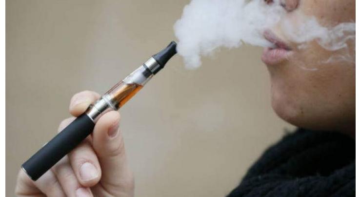 Top US doctor urges 'aggressive' steps against e-cigarettes
