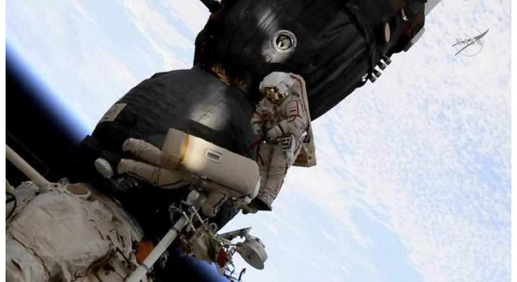 Astronauts land from ISS stint marred by air leak, rocket failure
