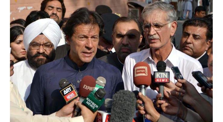 Defene Minister Pervez Khattak calls on Prime Minister Imran Khan 
