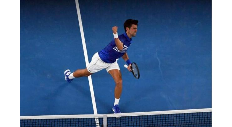 Emphatic Djokovic lines up Tsonga Aussie Open showdown
