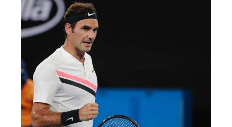 Federer battles into Australian Open third round
