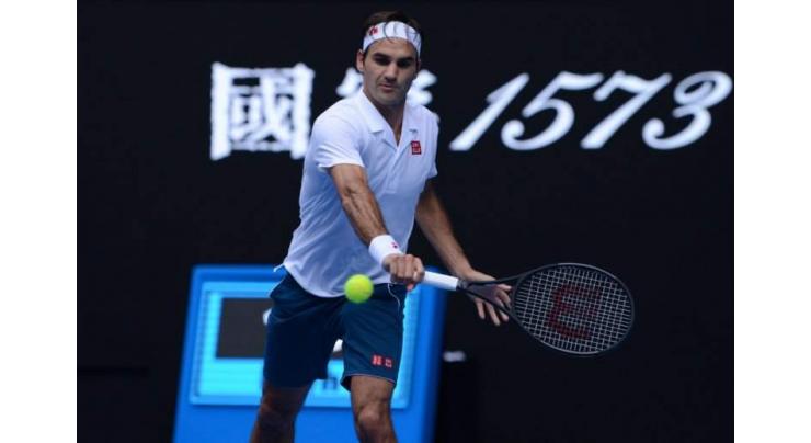 Federer, Nadal stay on track as Sharapova sets up Wozniacki showdown
