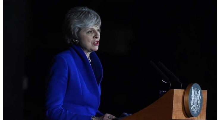 British Prime Minister Theresa May  urges MPs to put national interests first
