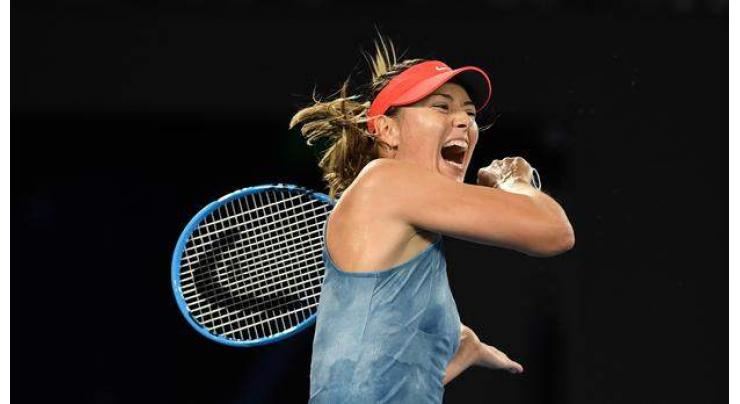 Sharapova upsets defending champion Wozniacki
