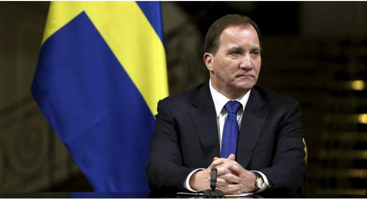Swedish lawmakers elect PM Lofven to second term
