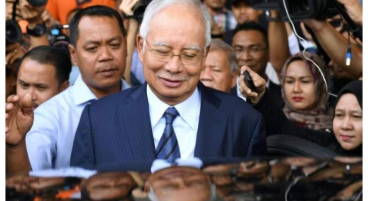 Malaysia says Goldman apology not enough, wants $7.5 bn
