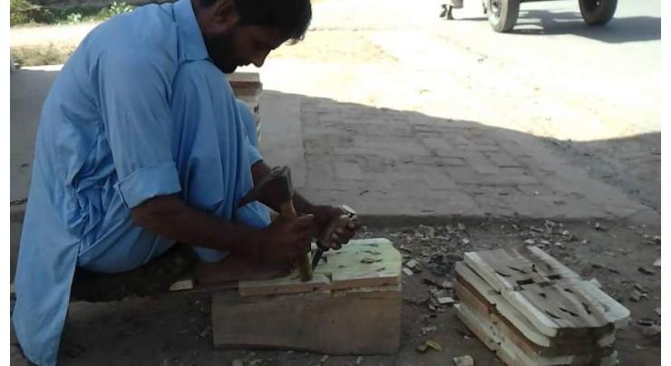 Wood's art work Silanwali popular at international level: Fazal ur Rehman
