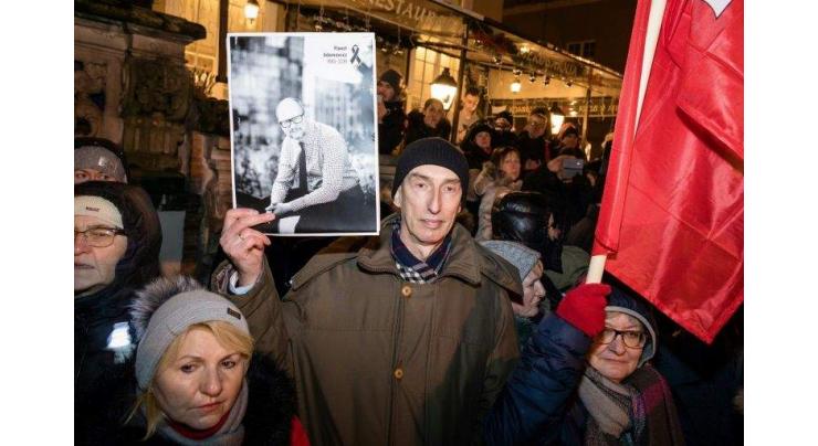 Poland bids emotional farewell to murdered mayor

