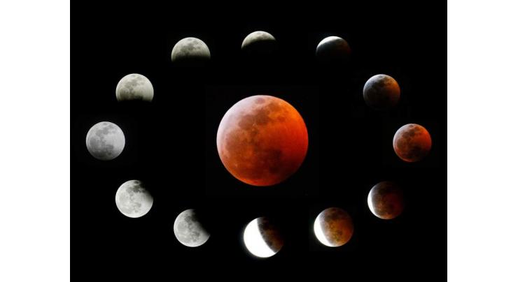 Total lunar eclipse woos sky watchers
