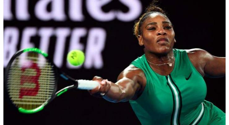 Serena muscles past top seed Halep into Open quarters
