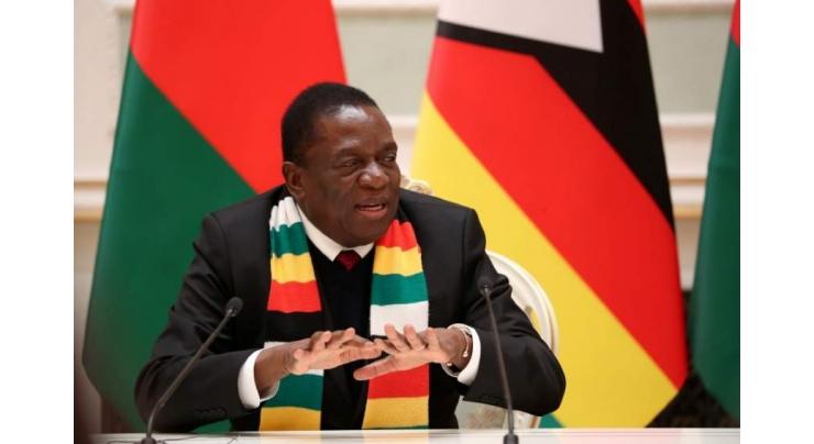 Zimbabwe president vows probe of security force misconduct
