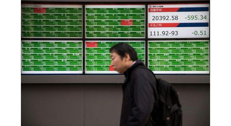Tokyo stocks close lower on Brexit, US shutdown worries
