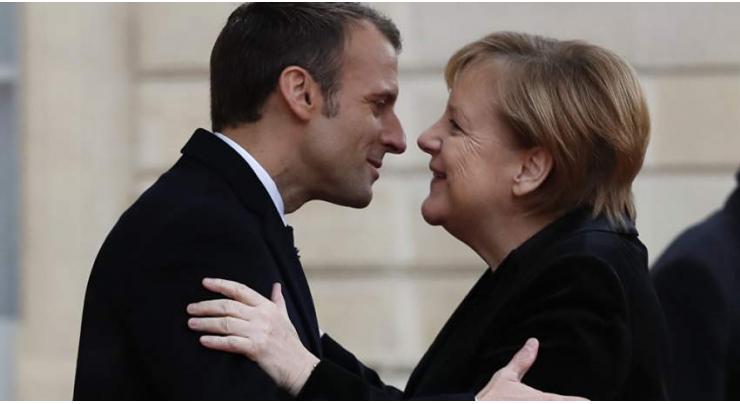 Macron, Merkel Sign Treaty on Franco-German Cooperation, Integration