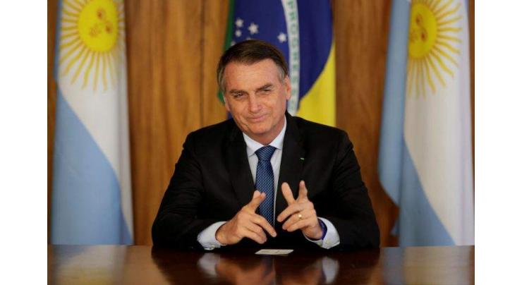 Far-right Bolsonaro sells 'new Brazil' to Davos elite
