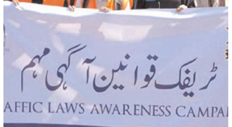 PTI MPA Rabia Basri leads traffic laws awareness walk
