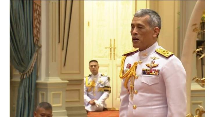 Thai king signs decree approving first election since coup
