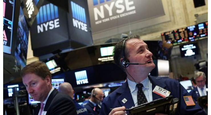 US stocks solidly lower at start of news-jammed week
