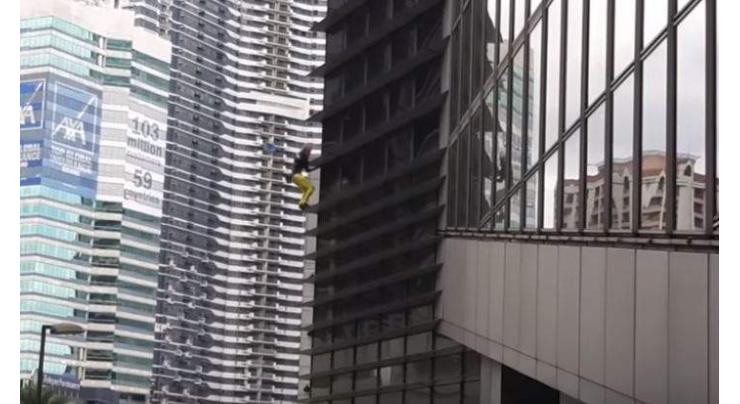 'French Spiderman' arrested after scaling Manila skyscraper
