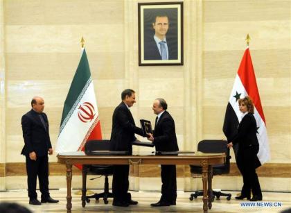إعادة- سوريا وإيران يوقعان عدد من الاتفاقات في مجالات مختلفة تشمل الطاقة والنظام المصرفي